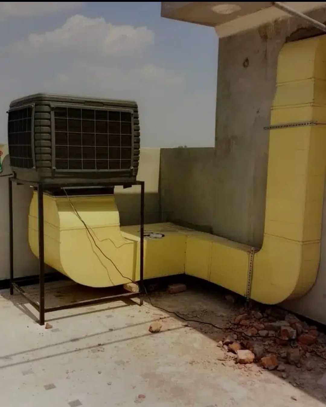 Duct evaporative air cooler system